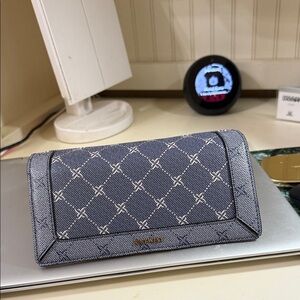 Nine West blue logo wallet. Clutch. NWOT so cute.  Matching pieces listed .